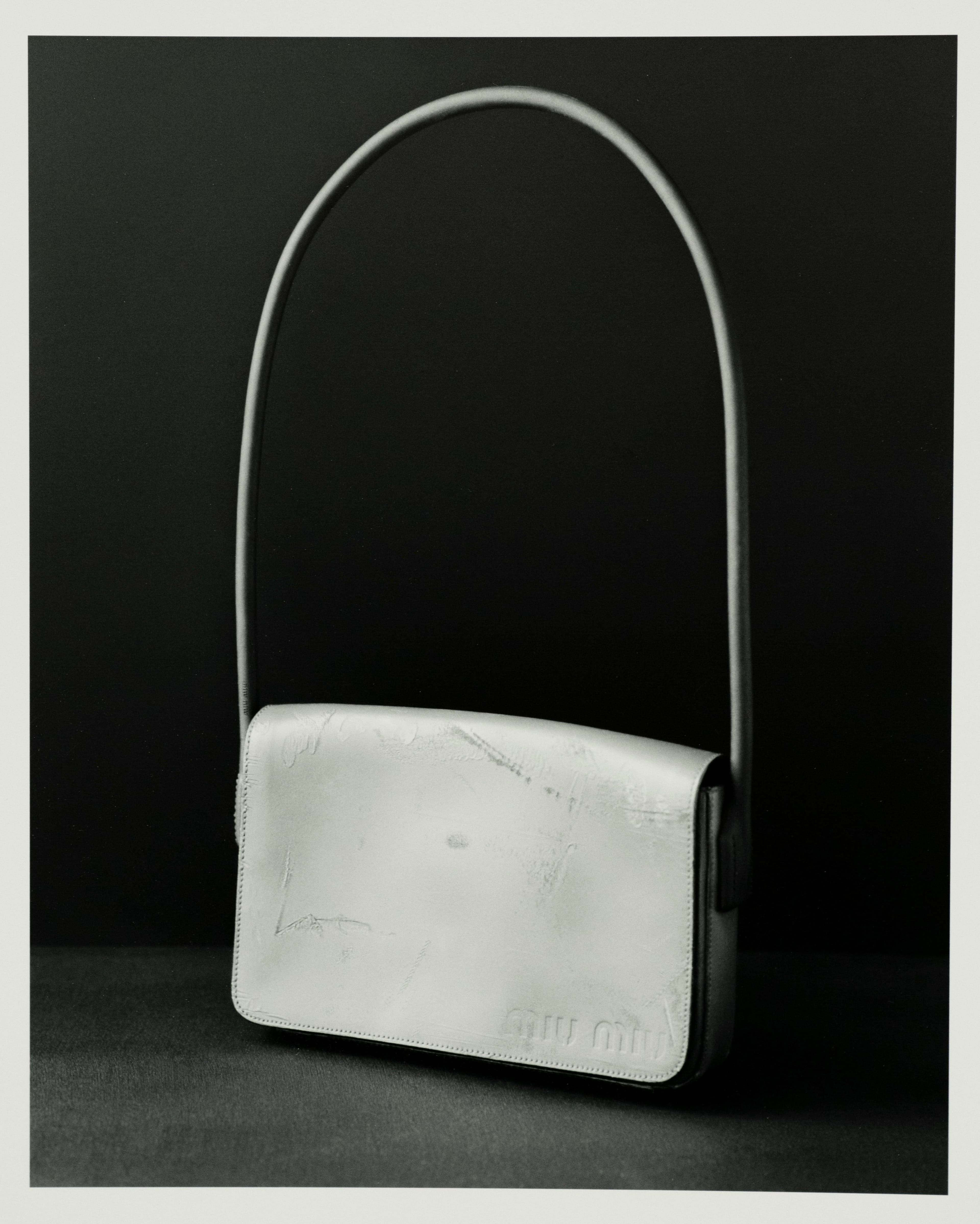 Vintage bag by Miu Miu, Fall 1998, from the David Casavant Archive. First presented with the Fall 1998 collection, this handbag represents an era of simple, ladylike silhouettes in Miuccia Prada’s contemporary line.