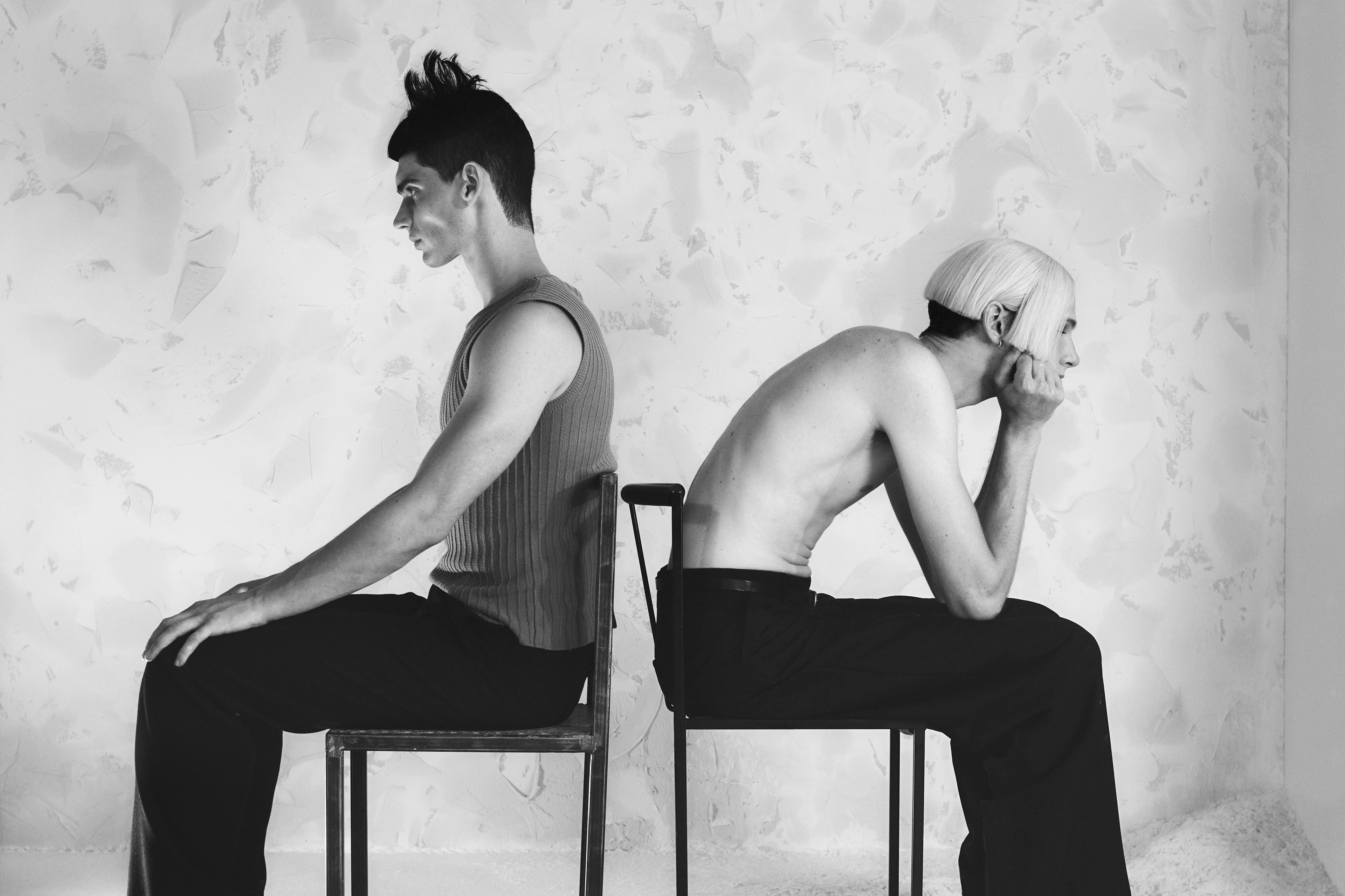 From left: Hughes wears vintage top by Raf Simons from Artifact. Pants by Givenchy. Frye wears pants by Ouer. Belt by Artemas Quibble.