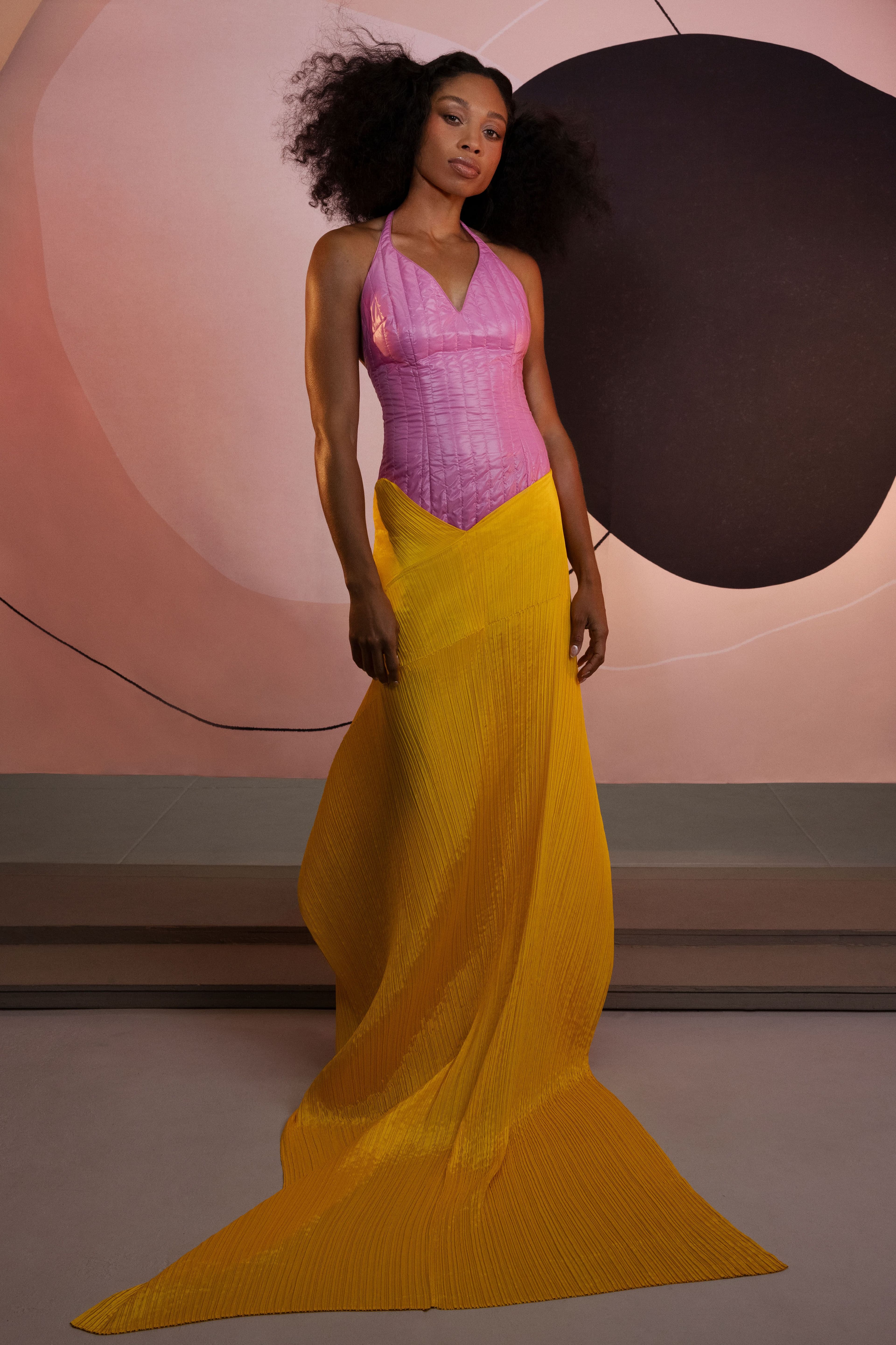 Bodysuit by Miu Miu. Stole, worn as skirt, by Pleats Please Issey Miyake.