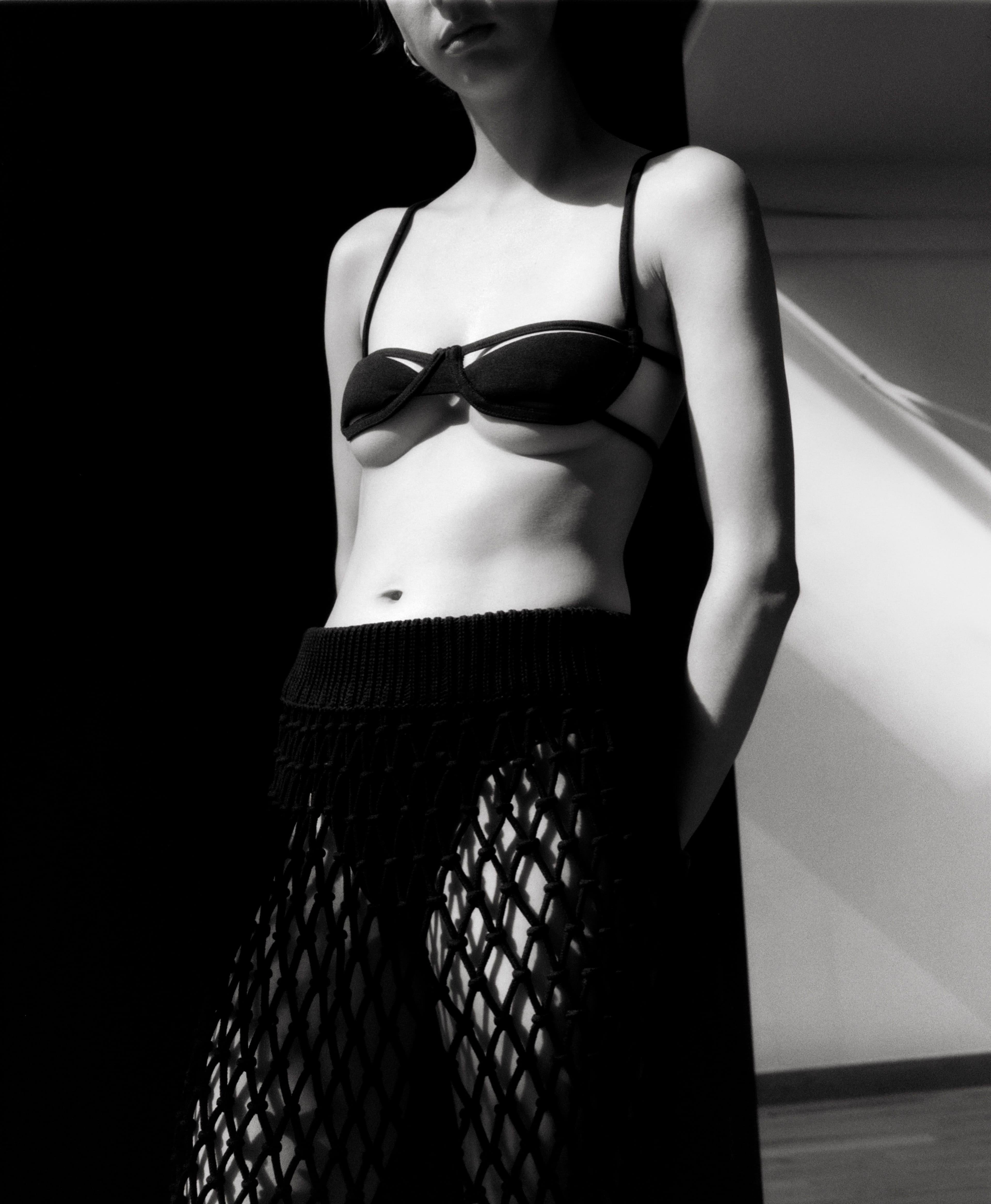 Bra by LRS. Skirt by Hyke. Underwear by Cuup. Earrings by Santangelo.