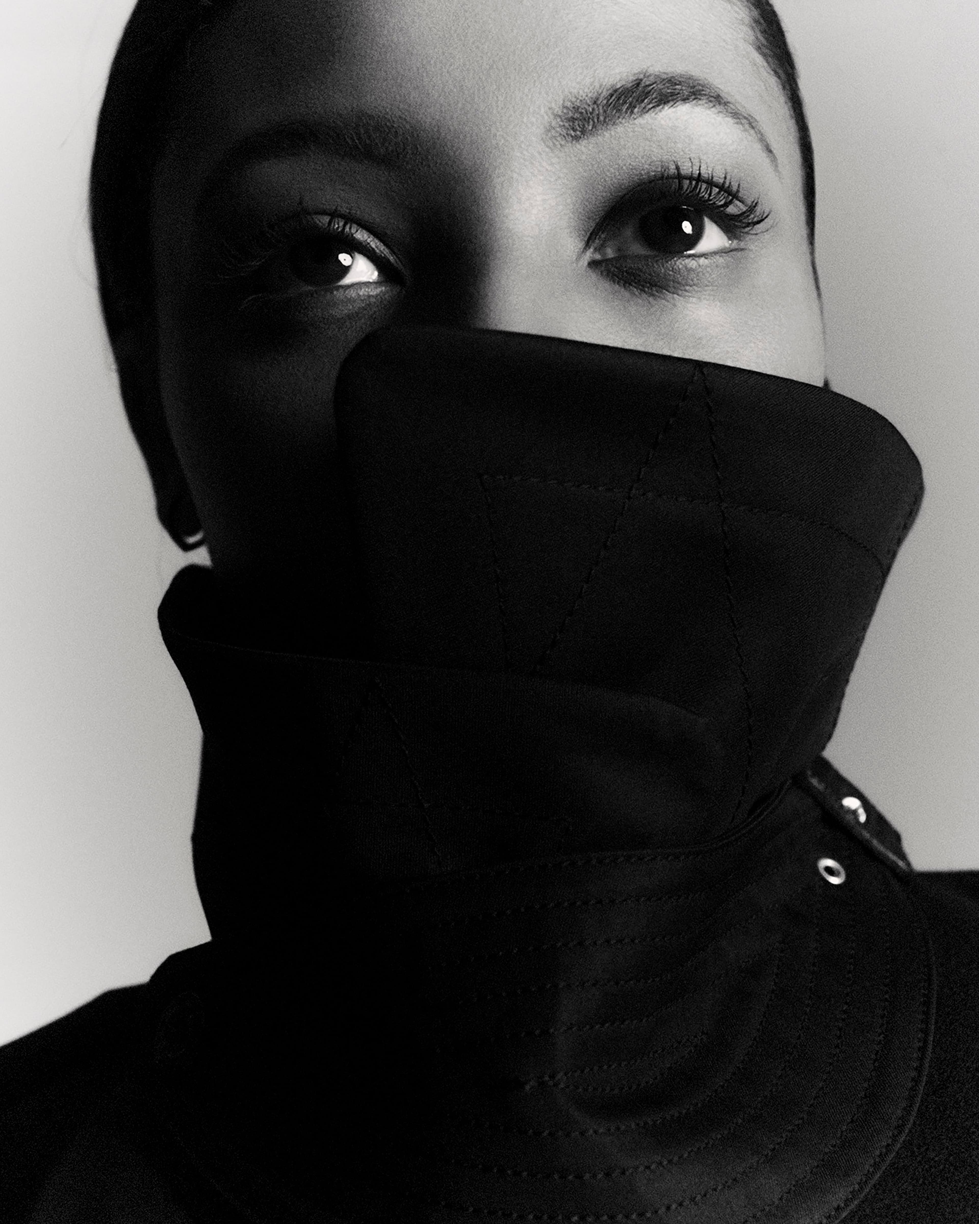 Trench coat by Sacai. All jewelry throughout by Repossi.