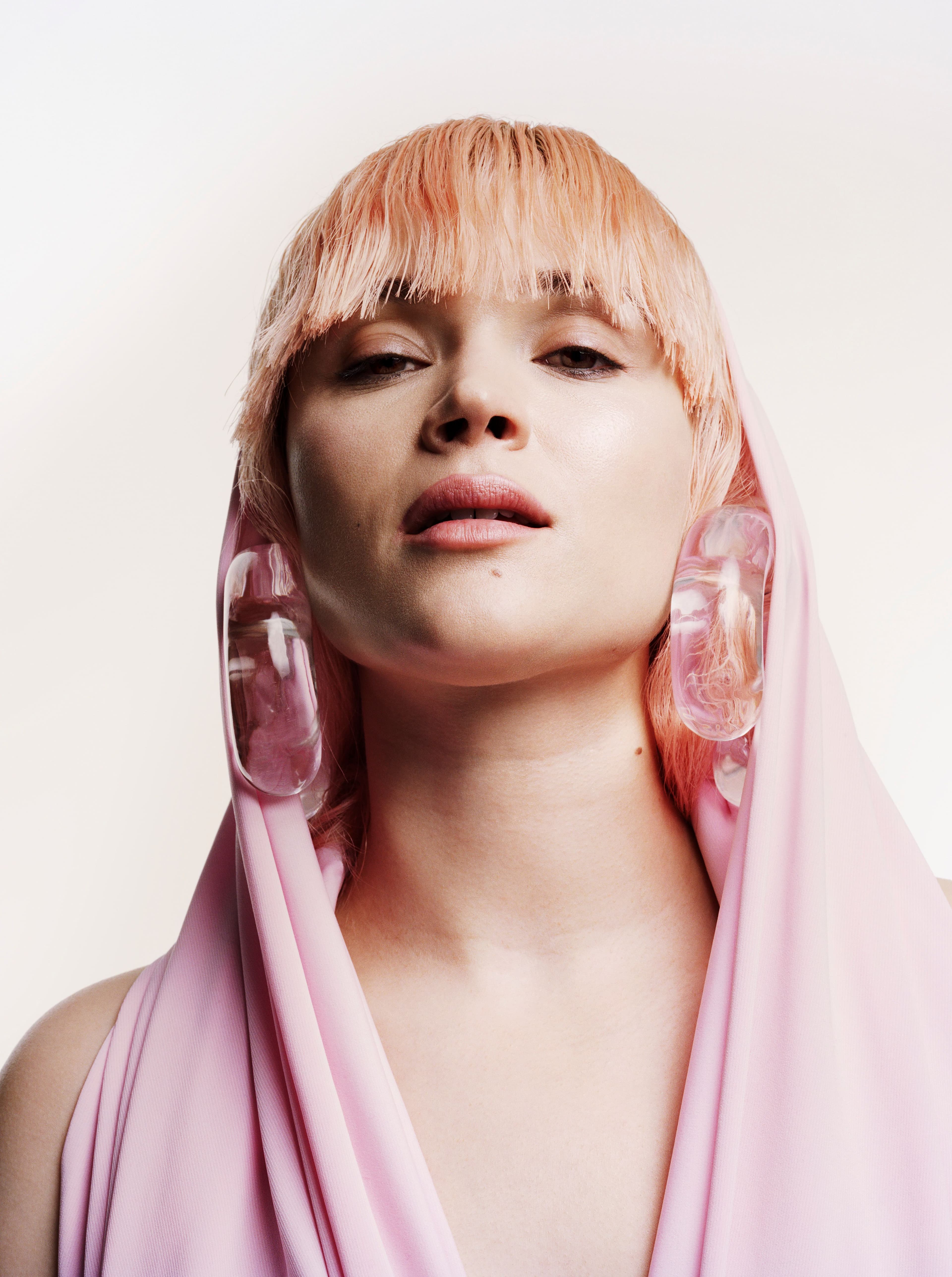 Scarf, stylist’s own. Earrings by Patricia Von Musulin.