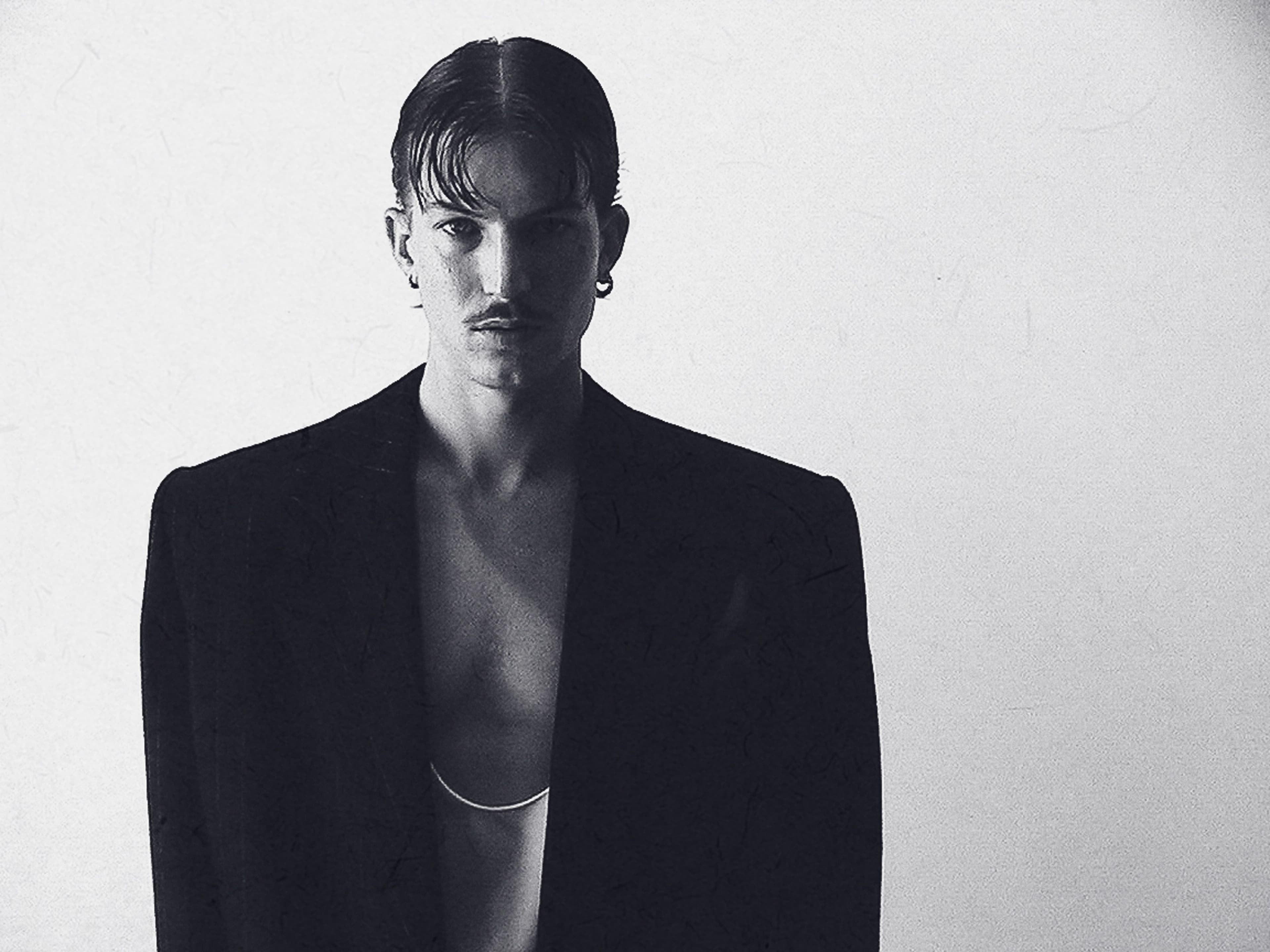 All clothing by Saint Laurent. All jewelry by Spinelli Kilcollin.