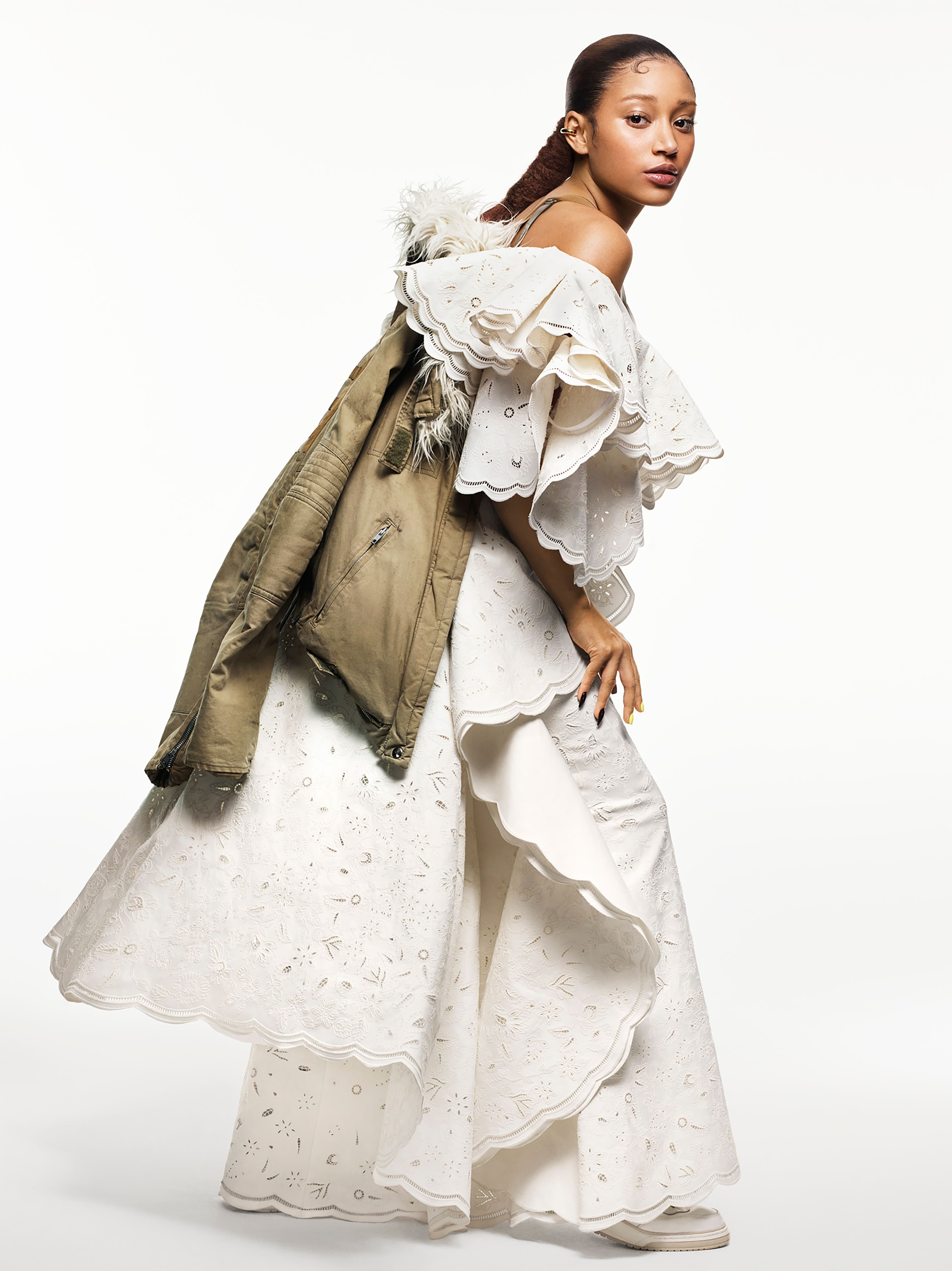 Vintage jacket by Helmut Lang from the David Casavant Archive. Dress by Loewe. Shoes by Linder x Mephisto. Ear cuff by Jennifer Fisher.