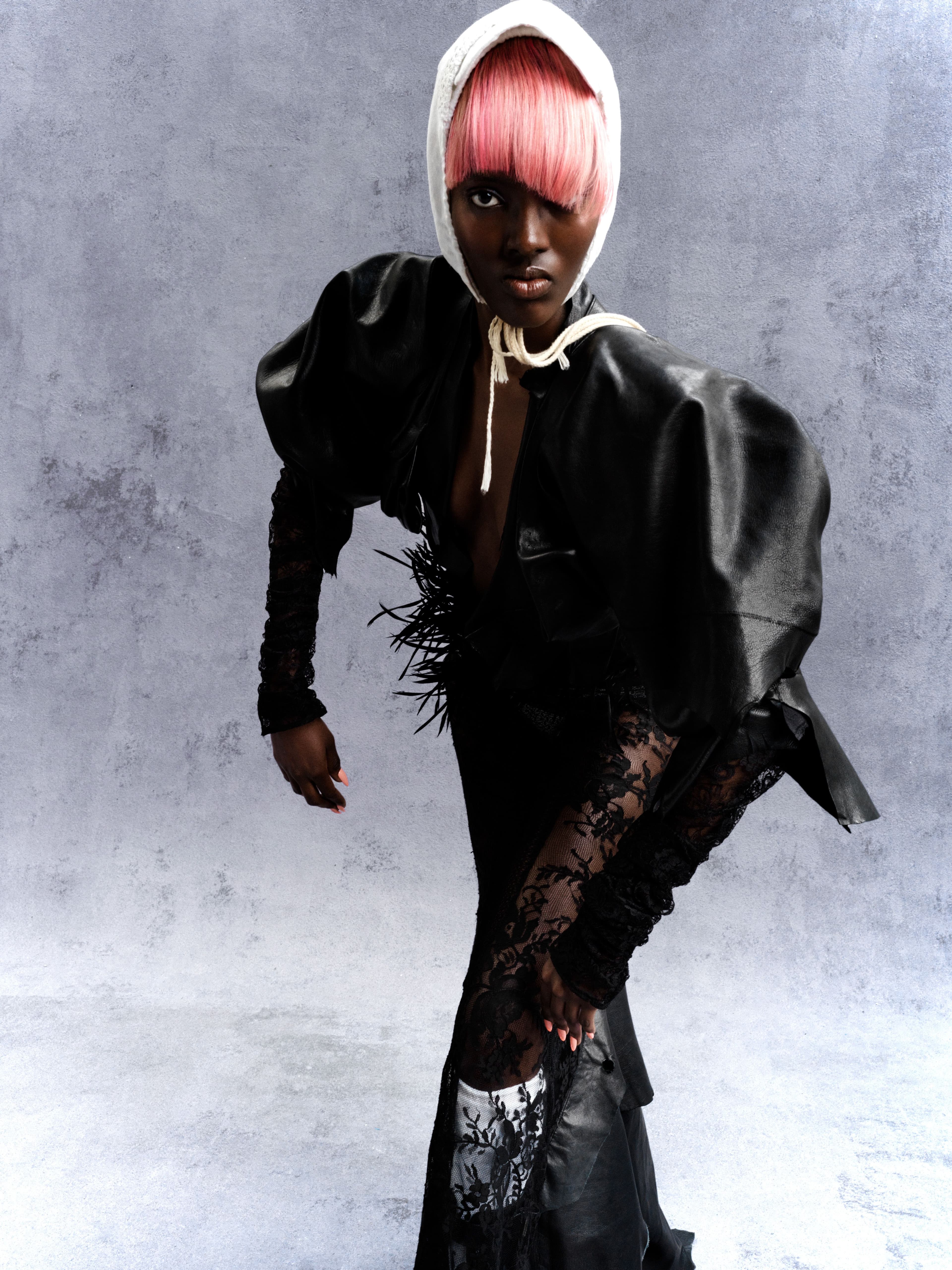 All clothing by Rika Kim. Headpiece by Per Götesson. Socks by Dsquared2.