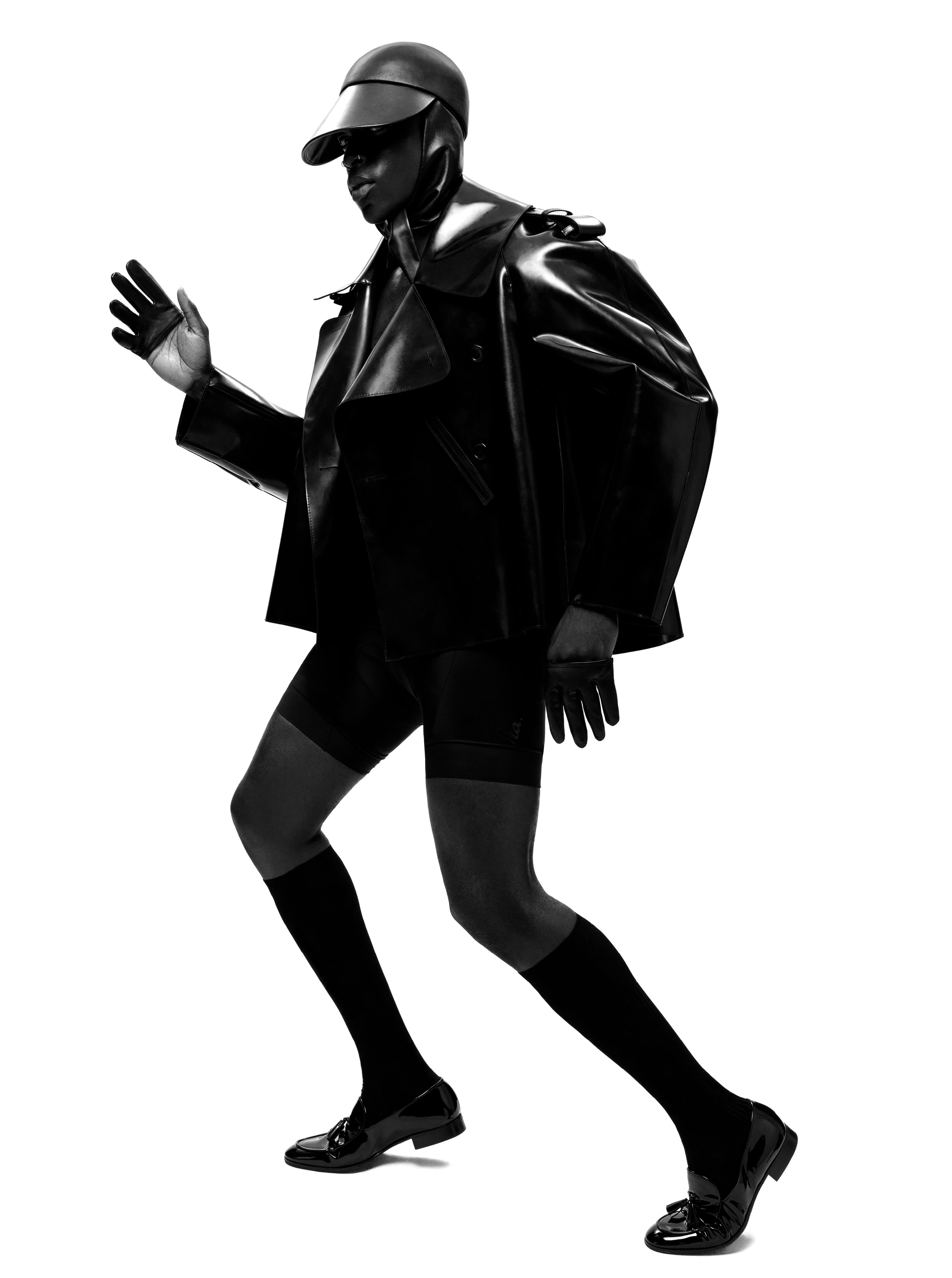 JACKET and HAT by ,Saint Laurent. ,SHORTS by ,Rapha,. GLOVES by ,Wing + Weft. ,SOCKS by ,Falke,. SHOES by ,Gianvito Rossi,.