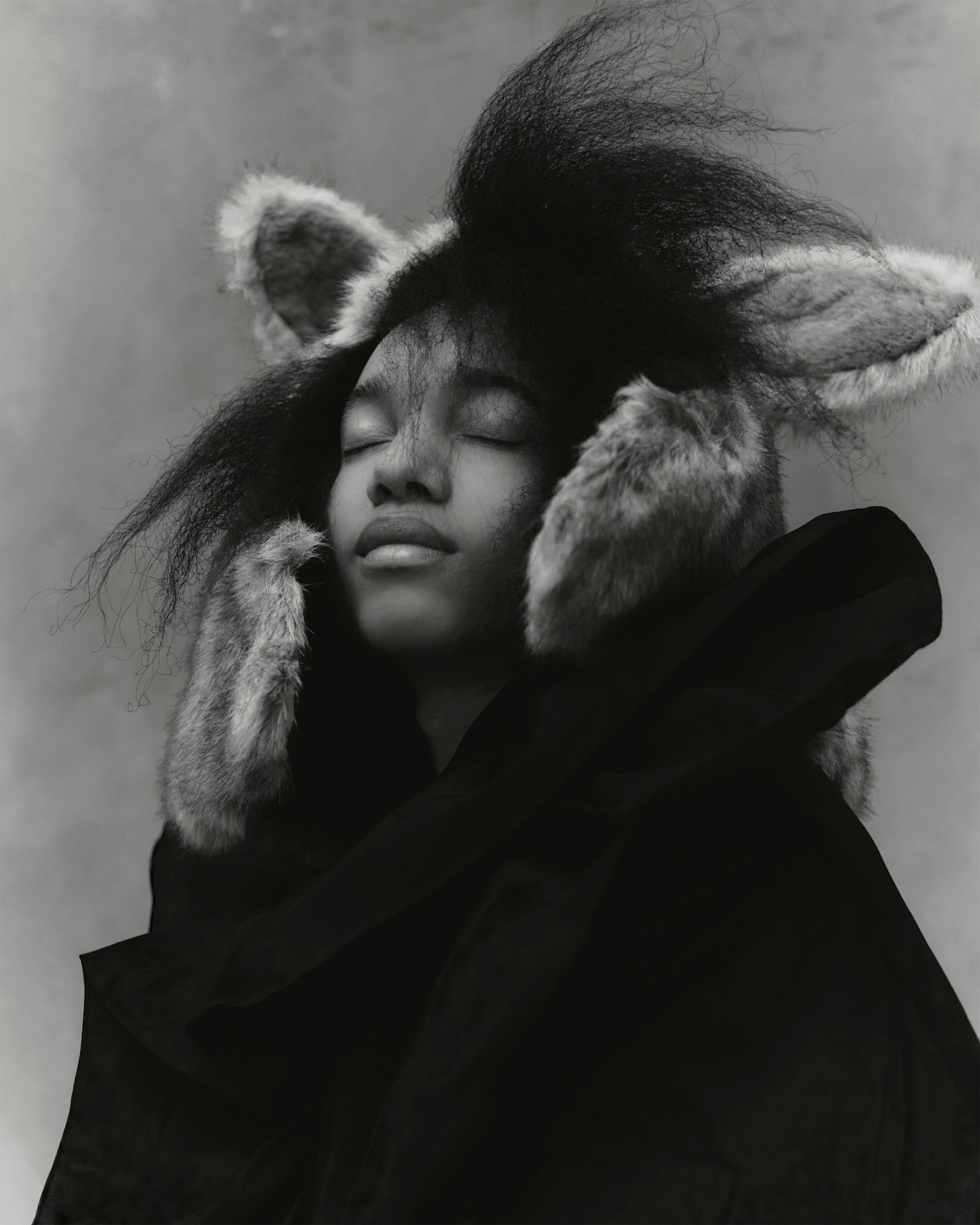 Jacket by Alexander McQueen. Headpiece from the Costume Studio.