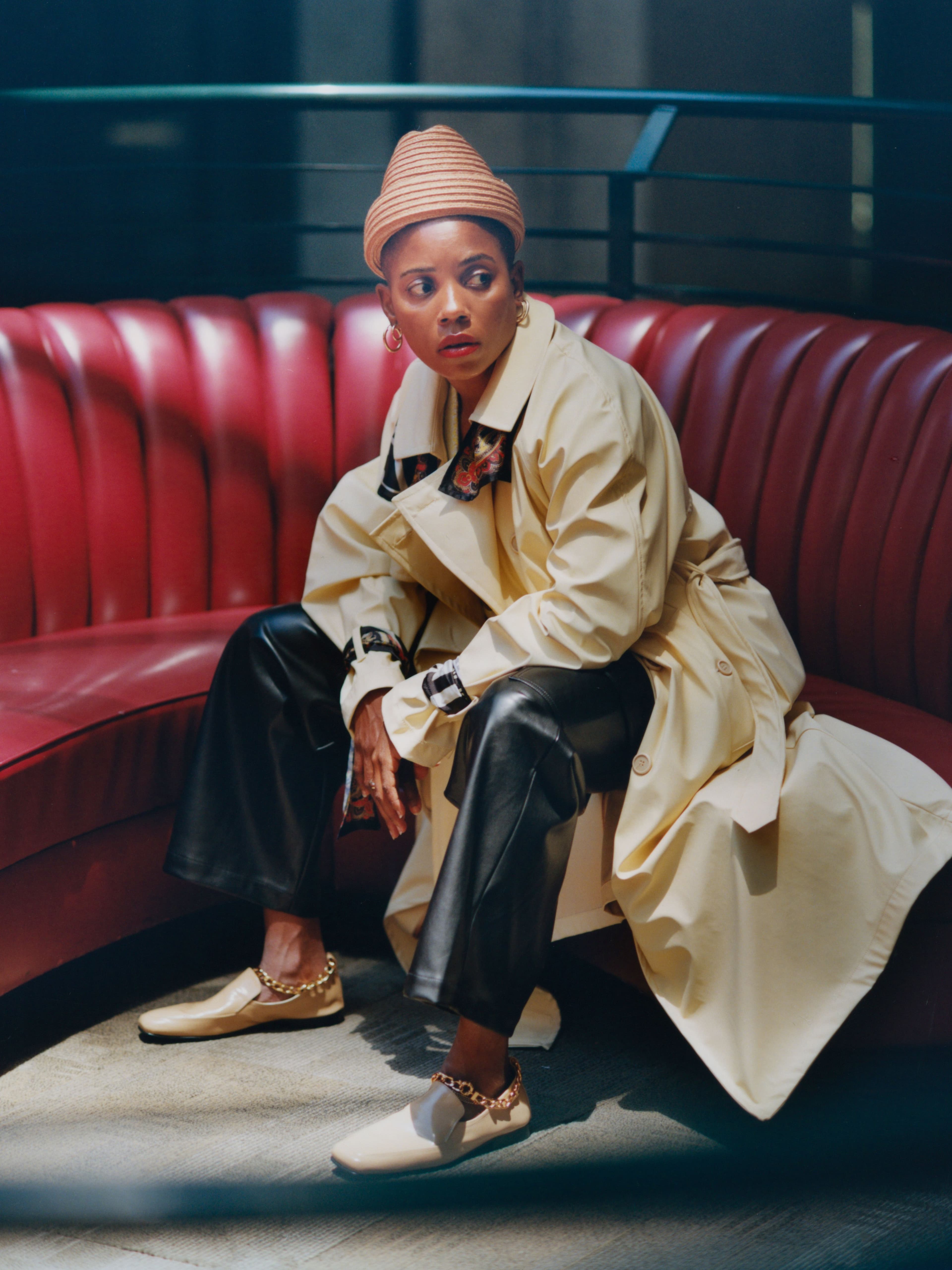 Trenchcoat by Ottolinger. Vest by The Elder Statesman. Pants by Nomia. Hat by ESENSHEL. Shoes by BY FAR. Earrings, Bravo’s own. Ring by E.M. Kelly.