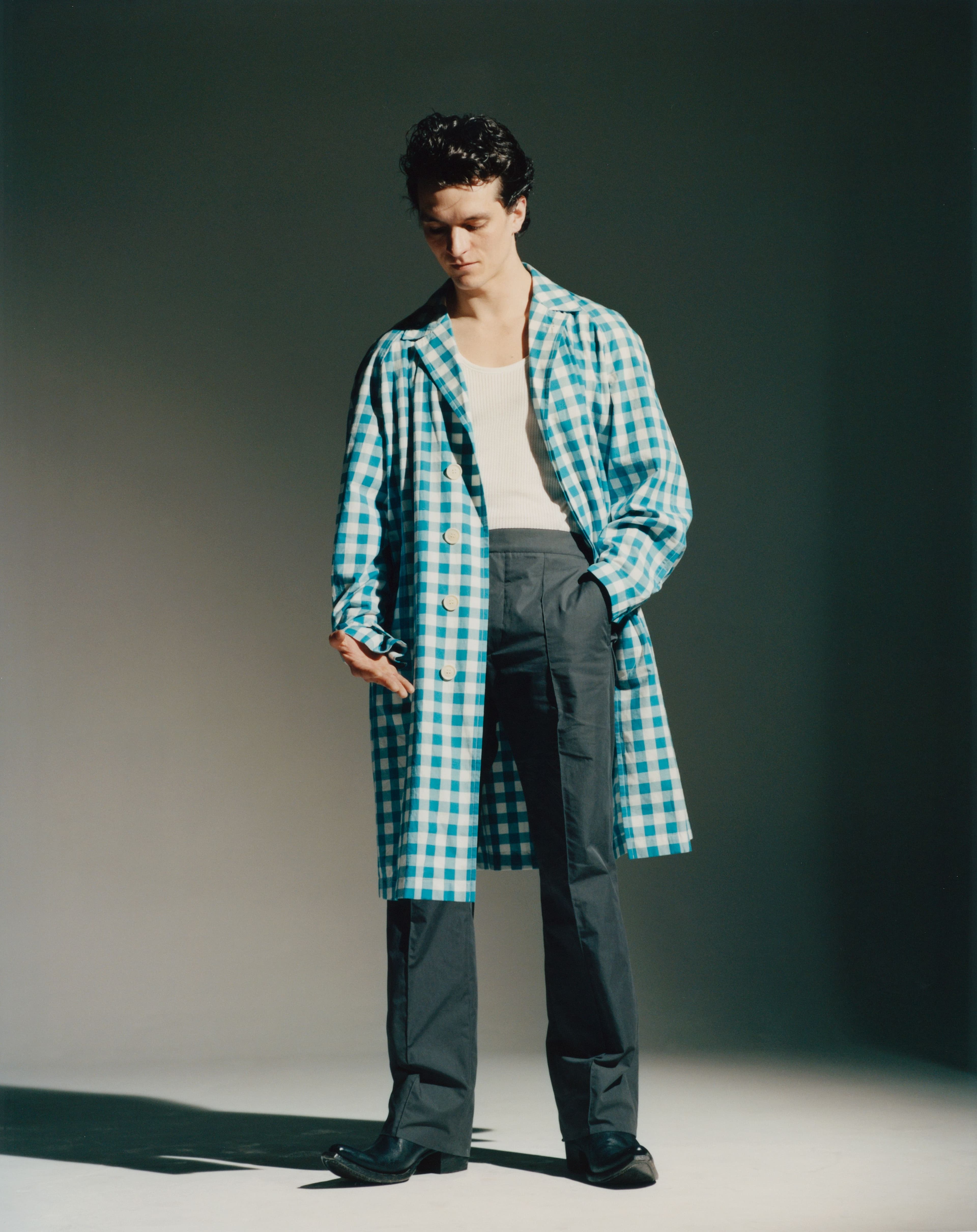 Coat and boots by Prada. Top, stylist’s own. Pants by Hermès.