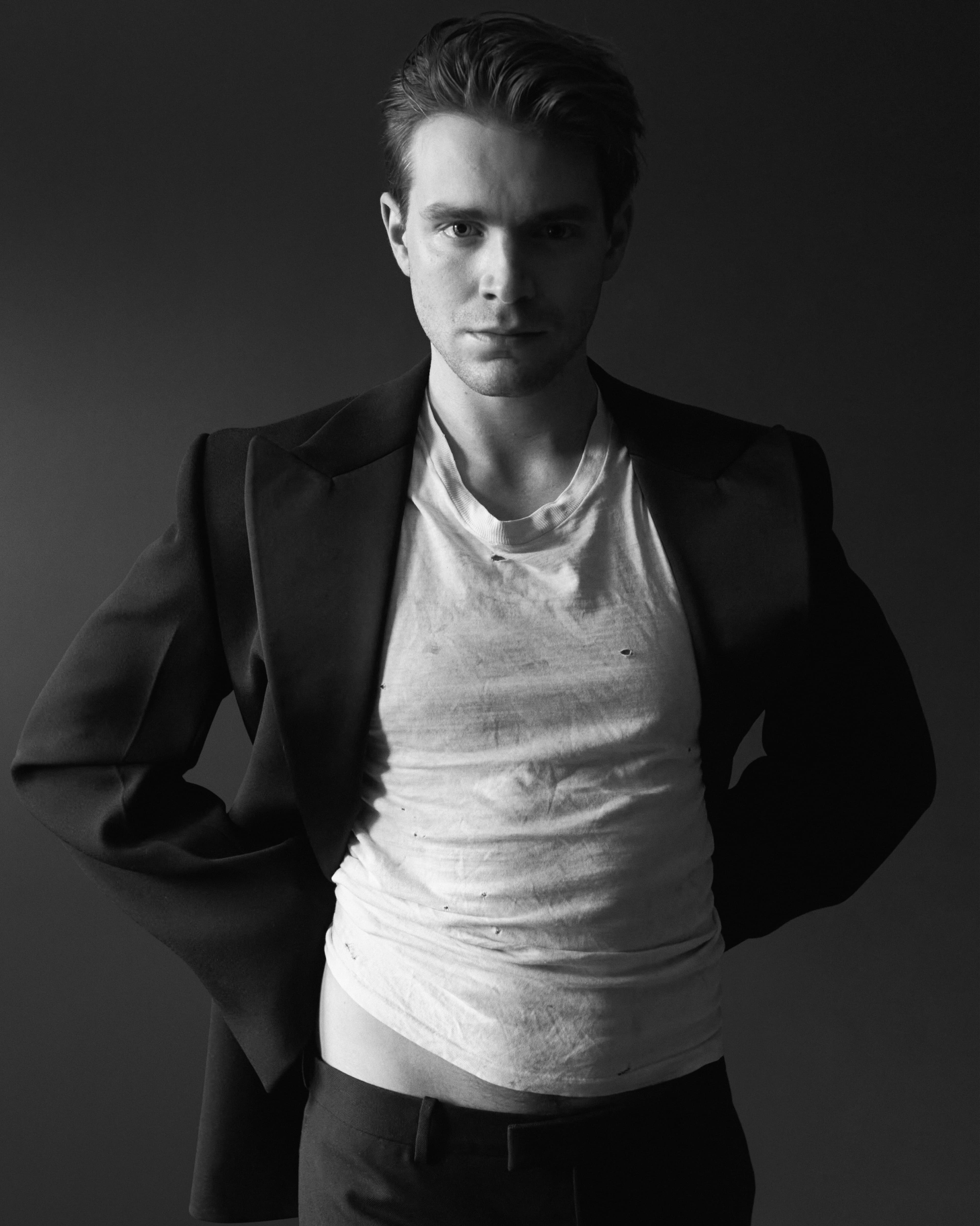 Jacket and pants by Ferragamo. Vintage t-shirt, stylist’s own.