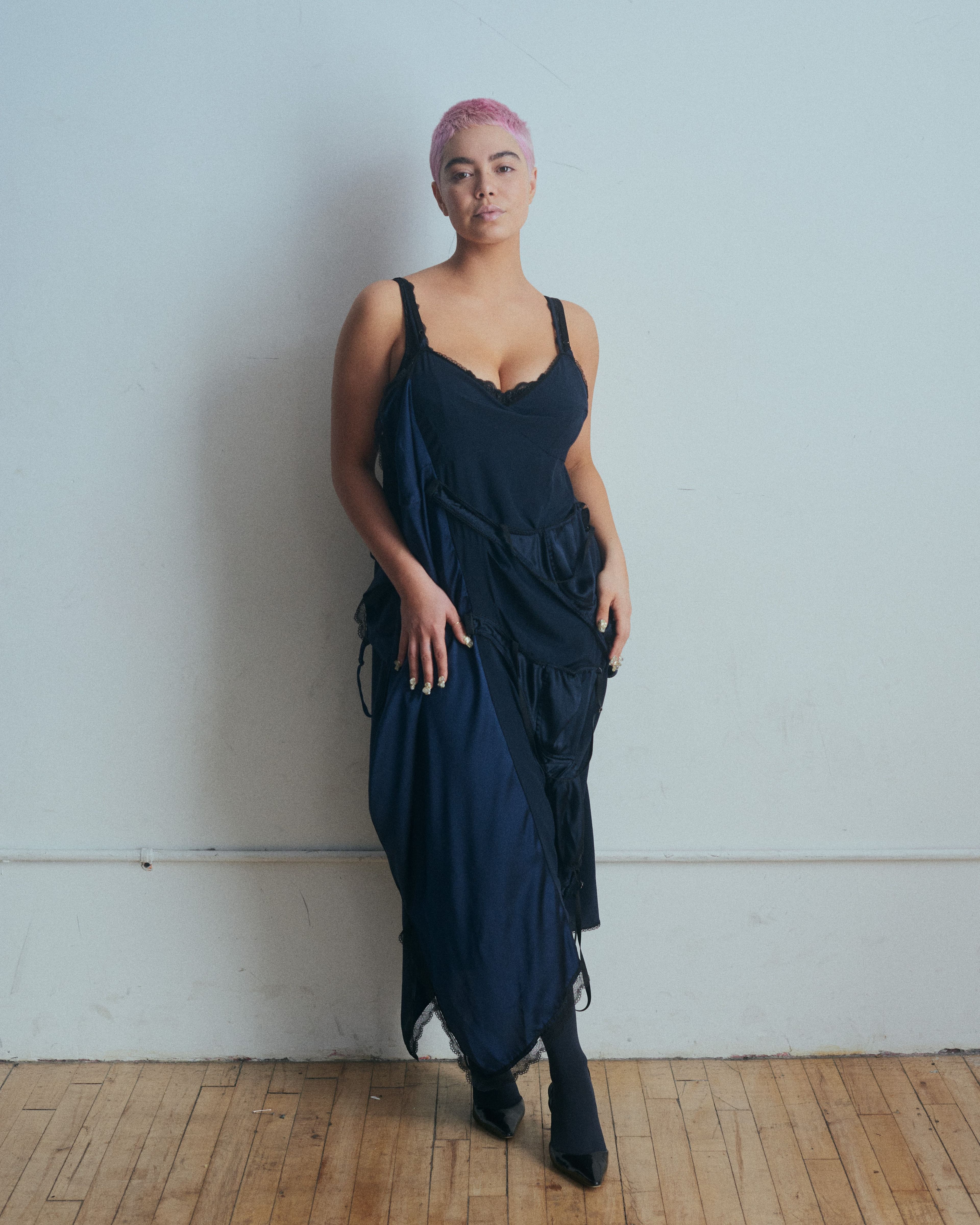 Dress by A——Company. Tights by Wolford. Shoes by Manolo Blahnik.