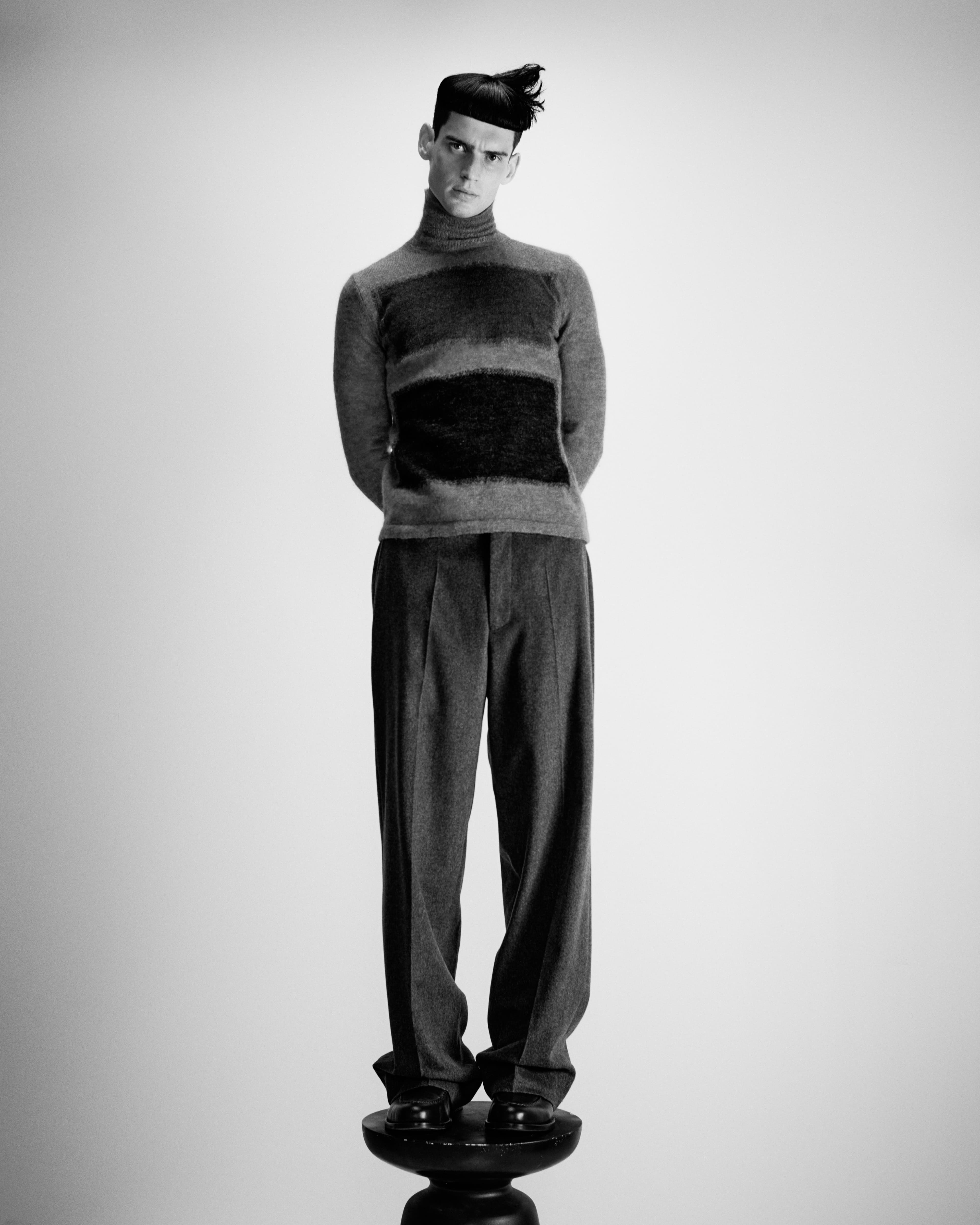 Vintage sweater by Raf Simons from Artifact. Pants and shoes by Officine Générale.