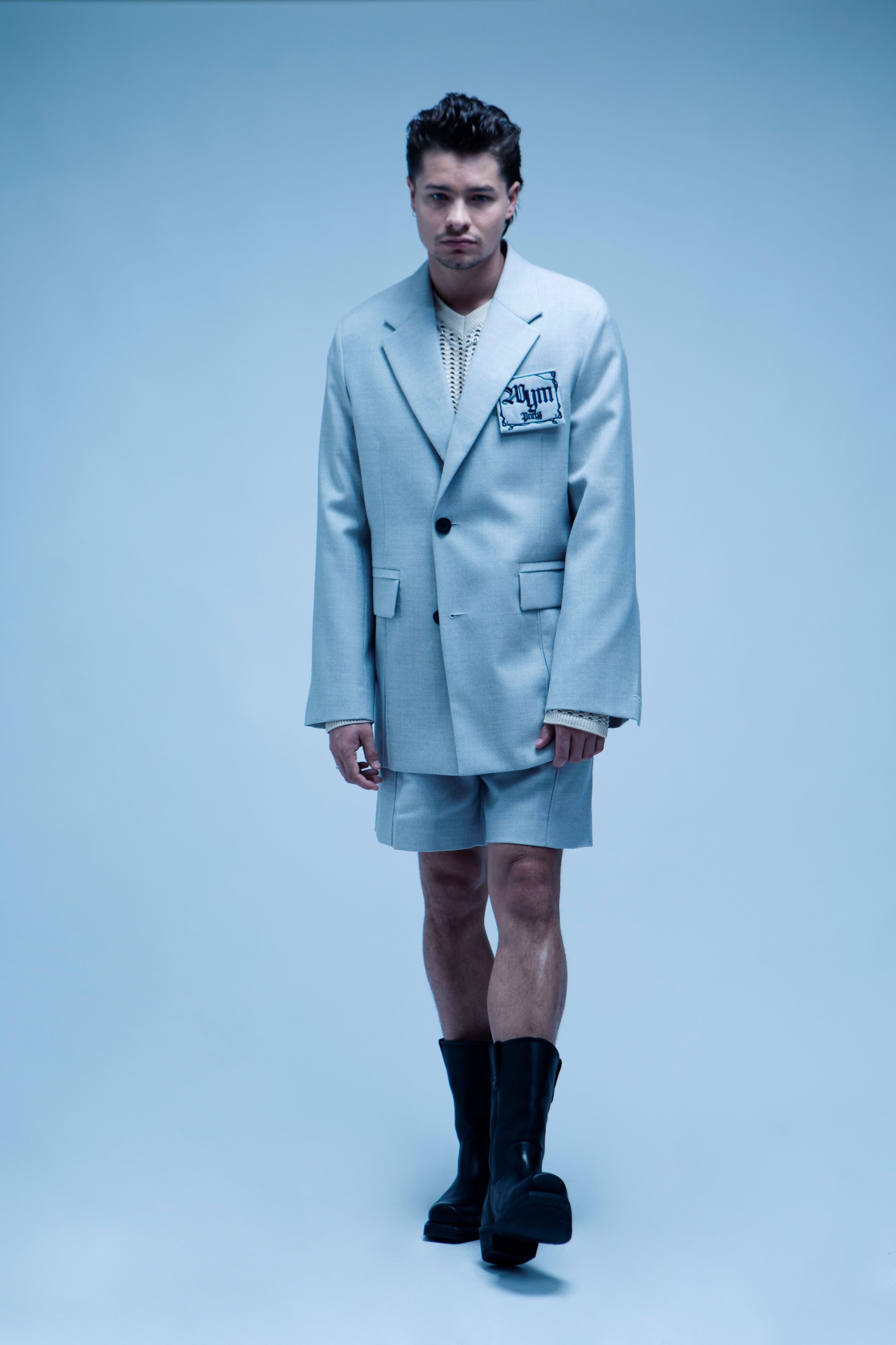 All clothing by Wooyoungmi. Boots by Our Legacy. Rings by Bleue Burnham.