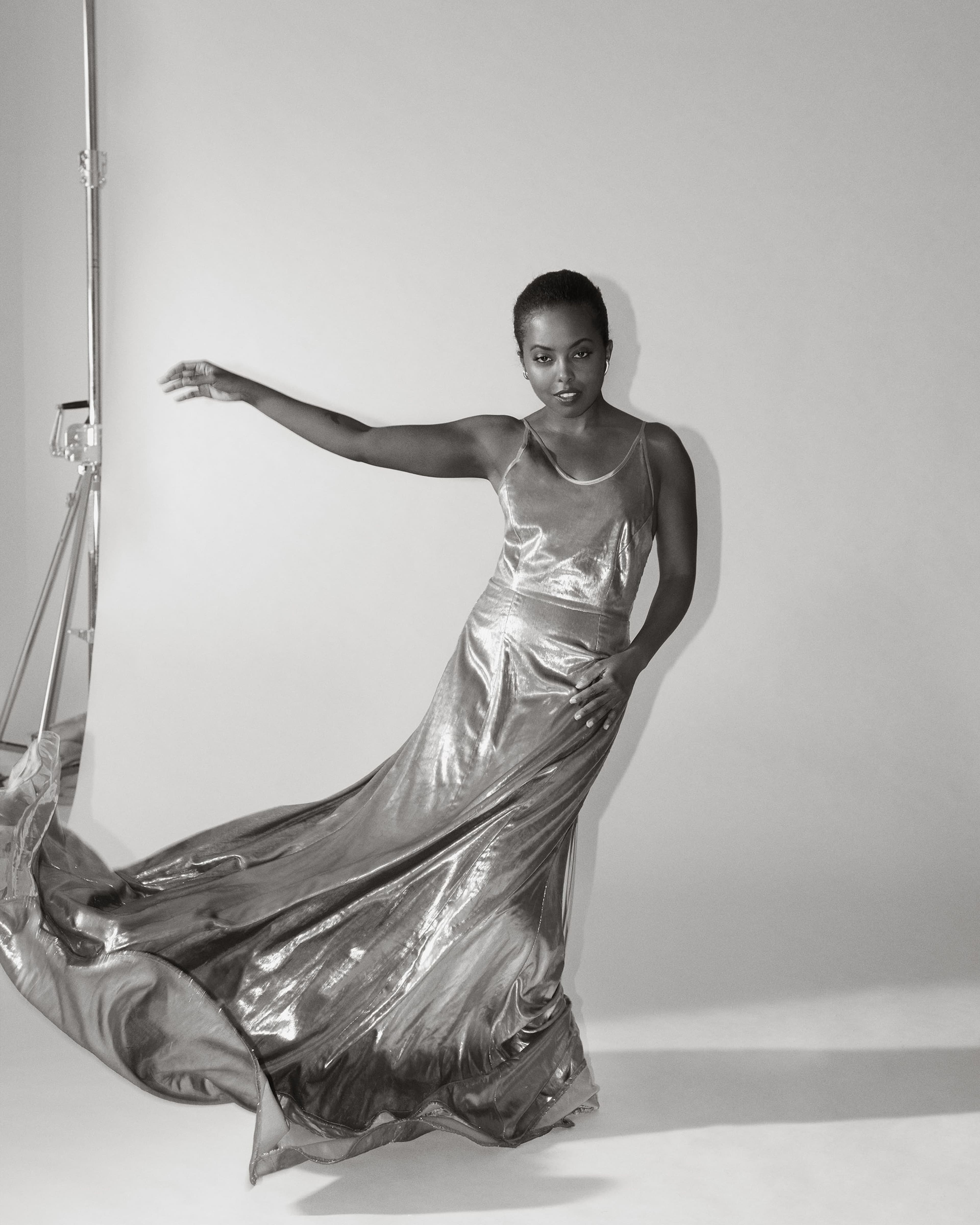 Dress by Christopher John Rogers. Earrings by Francesca Simons.