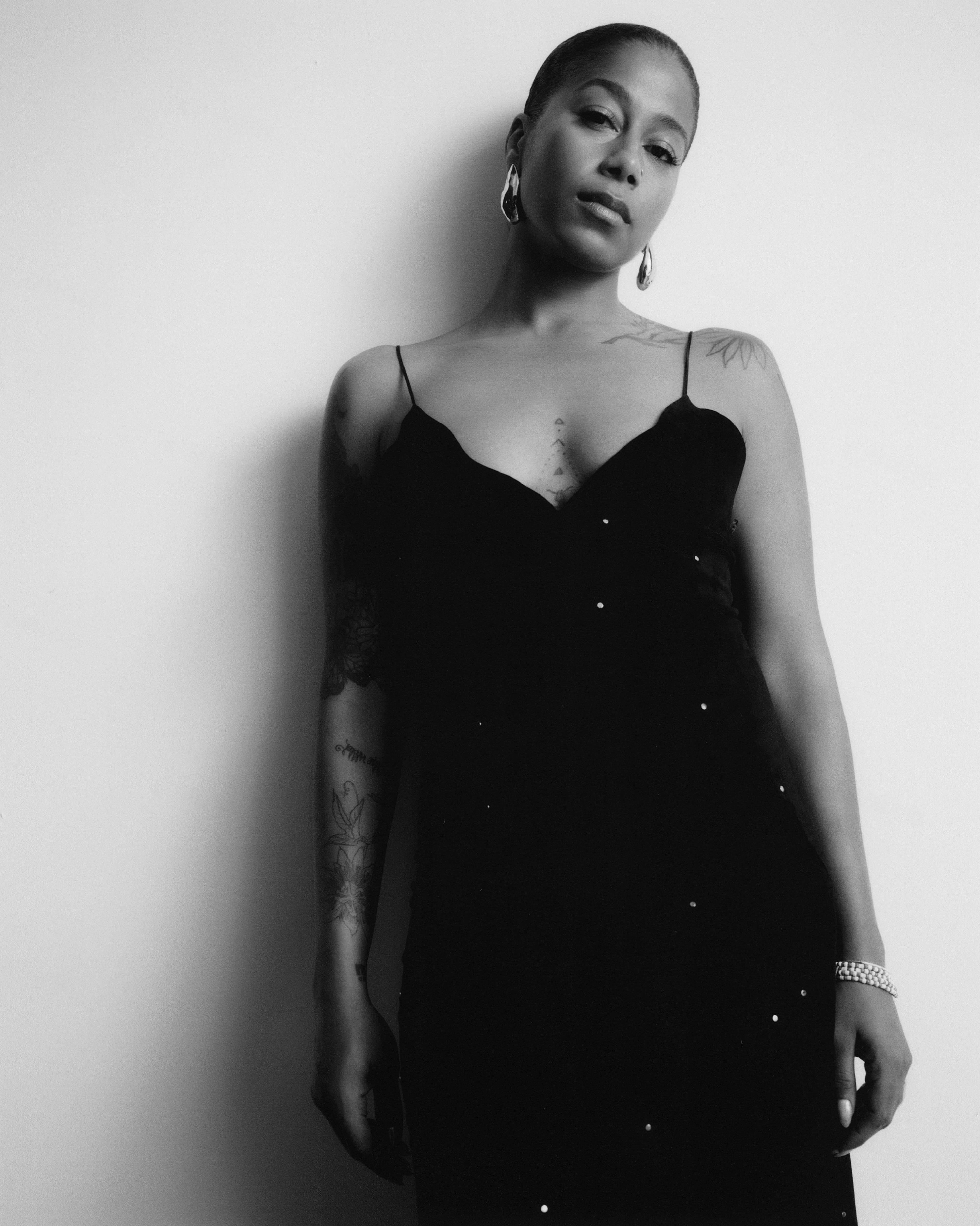 Dress by Chloé. All jewelry by Alexis Bittar.