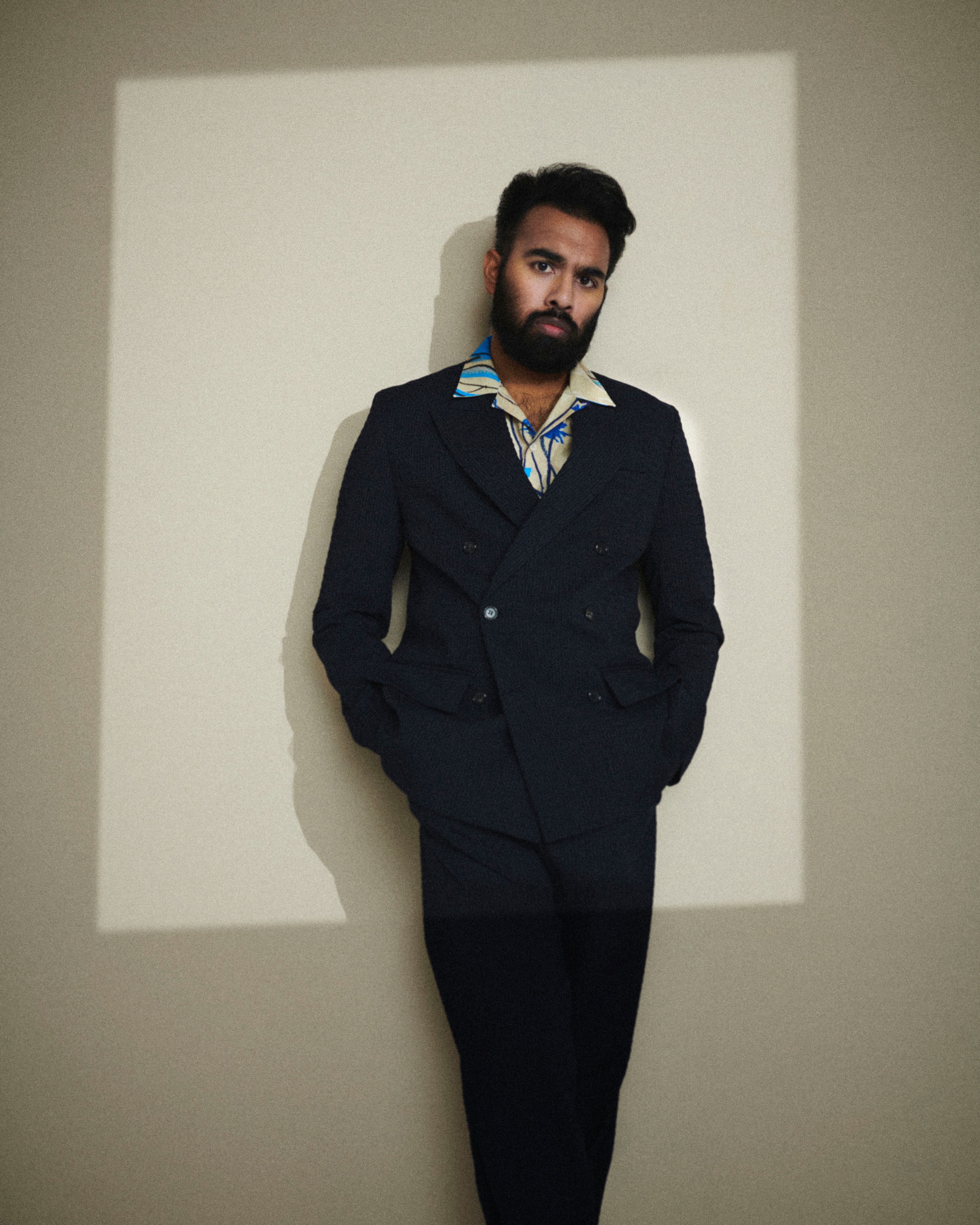 Suit by ADNYM. Shirt by Paul Smith.