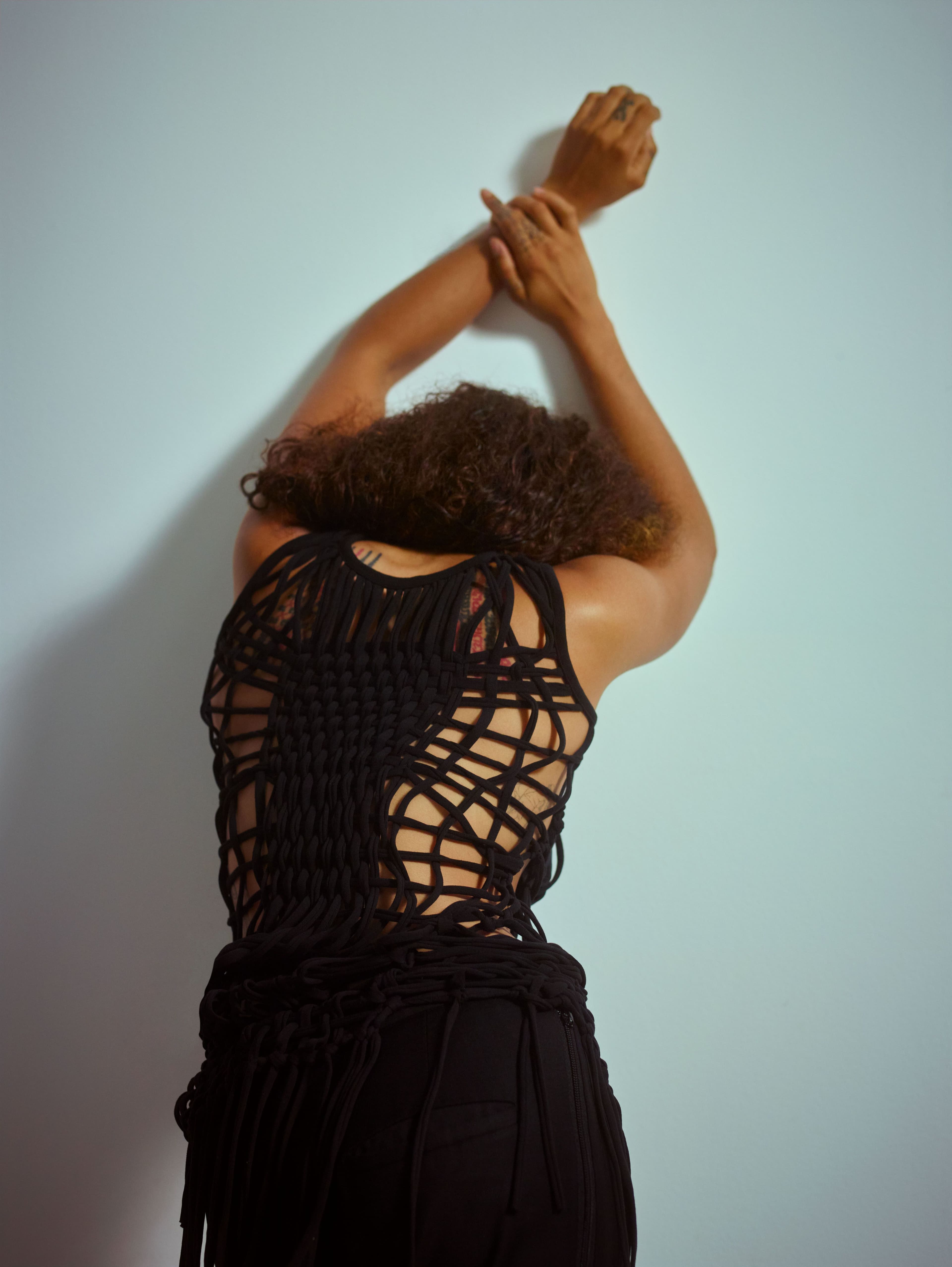 Vintage top by Jean Paul Gaultier. Vintage pants by Raf Simons.