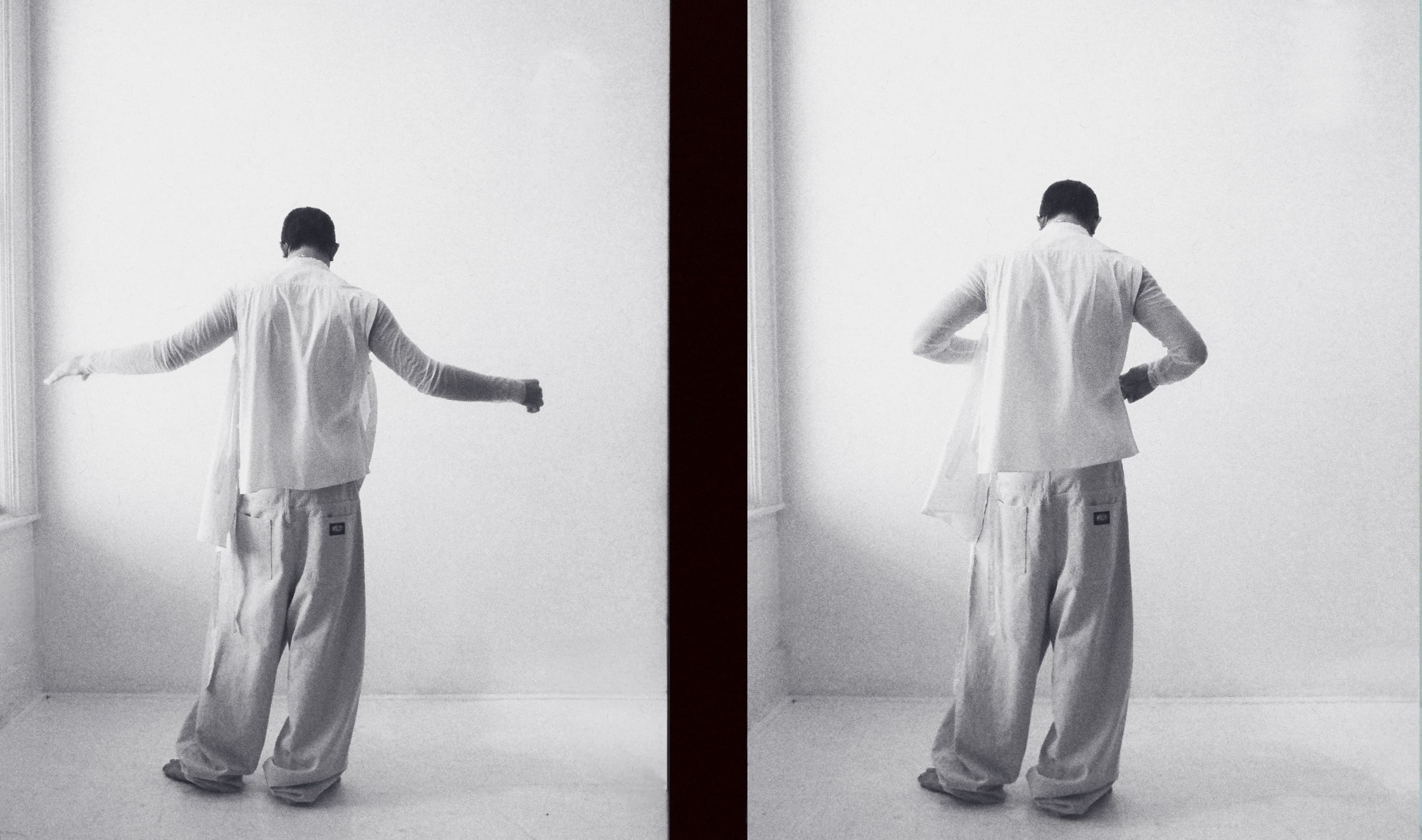 Vintage shirt by Helmut Lang. Top by The Row. Pants by Willy Chavarria. Underwear by CDLP. Earrings, necklaces, and ring by Spinelli Kilcollin. Necklaces by Martine Ali.